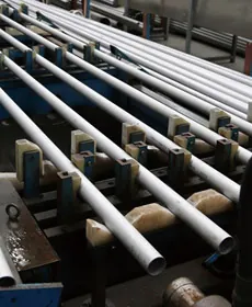 Seamless stainless steel tubes on the straightening line at the Thaida mill