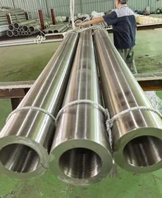 Heavy-wall seamless stainless steel pipes with machined ends in the workshop