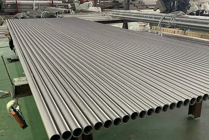 Straightened seamless tubes cut to length on the mill floor